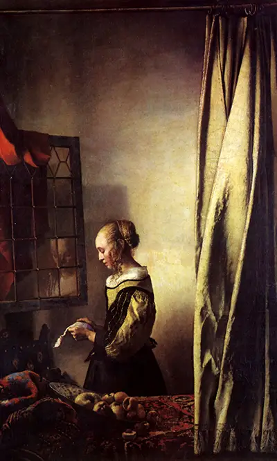 Girl Reading a Letter at an Open Window Vermeer